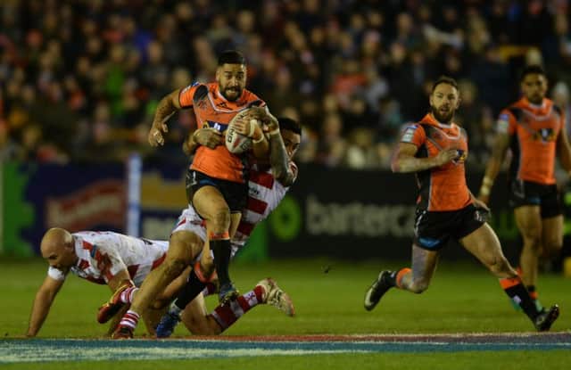 Rangi Chase on the attack for Castleford Tigers against Leigh Centurions in the opening weekend of the season.  Picture: Bruce Rollinson