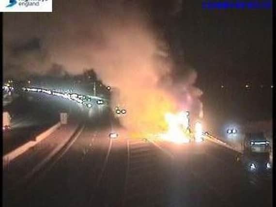 The lorry catches fire (Highways England)