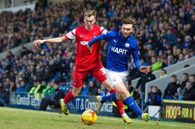 Chesterfield vs Leyton Orient - Jay O'Shea brings the ball past Leyton Orients Ryan Hedges - Pic By James Williamson