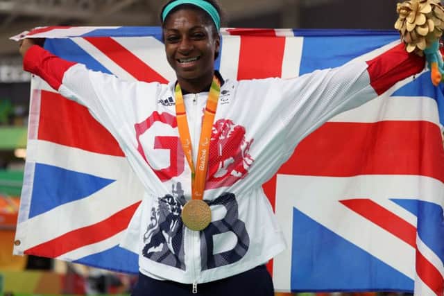 Great Britain's Kadeena Cox celebrates with her gold medal won in the Women's C4-5 500m Time Trial final at the Olympic Veleodrome during the third day of the 2016 Rio Paralympic Games in Rio de Janeiro, Brazil. (Picture: Andrew Matthews/PA Wire)