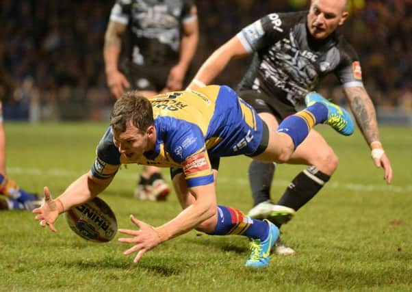 Danny McGuire looses grip of the ball just short of the line.
