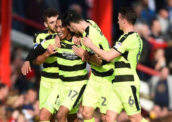 Huddersfield Town's Rajiv van La Parra (2nd left) celebrates scoring..