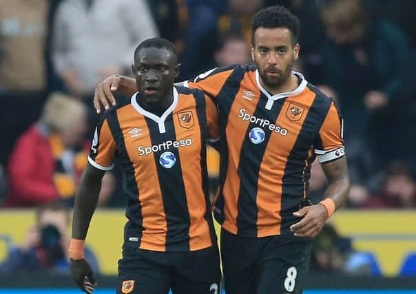 Hull City's Oumar Niasse (left) celebrates scoring his side's first goal.