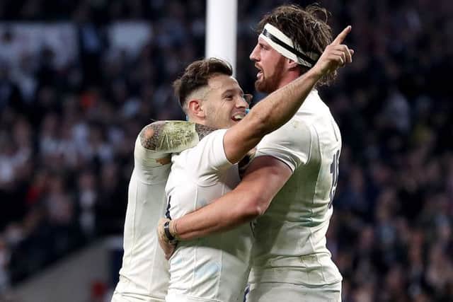 England's Danny Care (centre) celebrates after scoring his team's seventh try. Picture: Andrew Matthews/PA