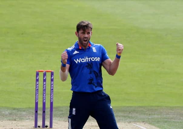 England's Liam Plunkett celebrates after taking a wicket. Pictur: Richard Sellers/PA