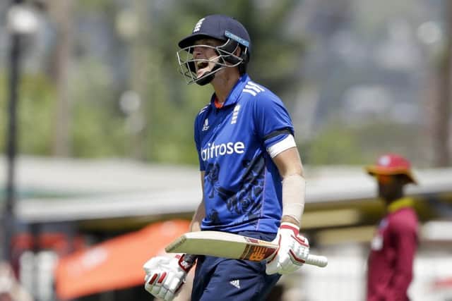 England's Joe Root celebrates scoring a century against West Indies during the 3rd One Day International at the Kensington Oval. Picture: AP/Ricardo Mazalan