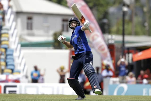 England's Joe Root celebrates scoring a century against West Indies at the Kensington Oval. Picture: AP/Ricardo Mazalan)