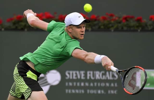 Kyle Edmund reaches for a shot against Novak Djokovic during their BNP Paribas Open second round clash in Indian Wells on Sunday. Picture: AP Photo/Mark J. Terrill