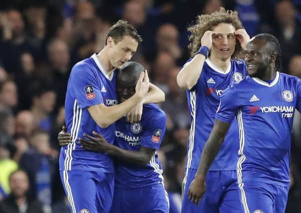 Chelsea players celebrate N'Golo Kante's winning goal (Picture: /Frank Augstein/AP).