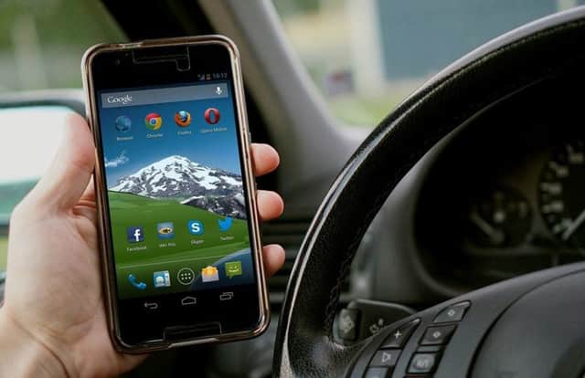 New penalties have been brought in to deter motorists from using mobile phones at the wheel.