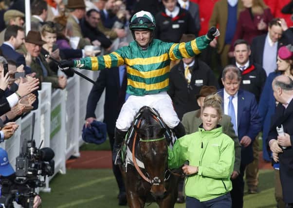 Buveur D'Air and Noel Fehily return after winning The Stan James Champion Hurdle Race at Cheltenham yesterday.