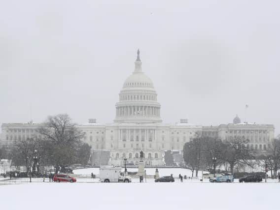 Snow covers The White House and Capitol Hill in Washington, D.C following the arrival of Storm Stella.