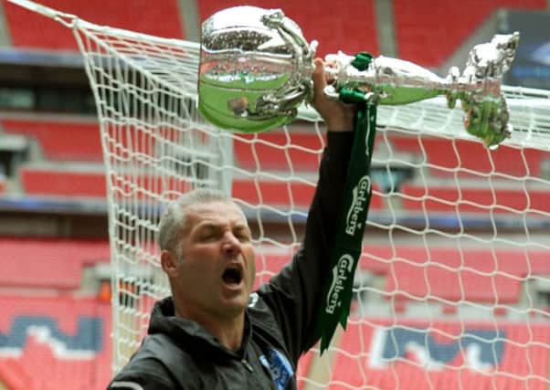 Those were the days: Gary Mills lifts the FA Trophy after York Citys 2012 final triumph against Newport County. (Picture: Gary Longbottom)