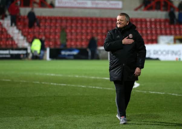 Sheffield United's Chris Wilder celebrates at the final whistle.