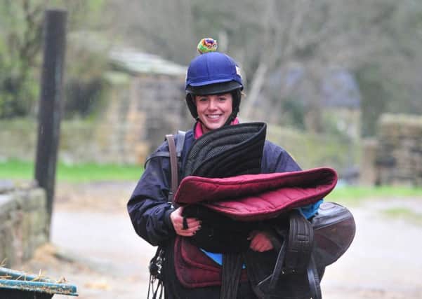 Taking the reins: Samantha England, who has a horse at Cheltenham for the first time, at her stables in Guiseley, Leeds.(Picture: Tony Johnson)