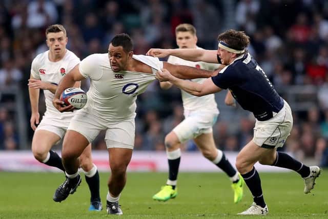 England's Billy Vunipola (left) and Scotland's Hamish Watson in action during the RBS Six Nations match at Twickenham Stadium, London.