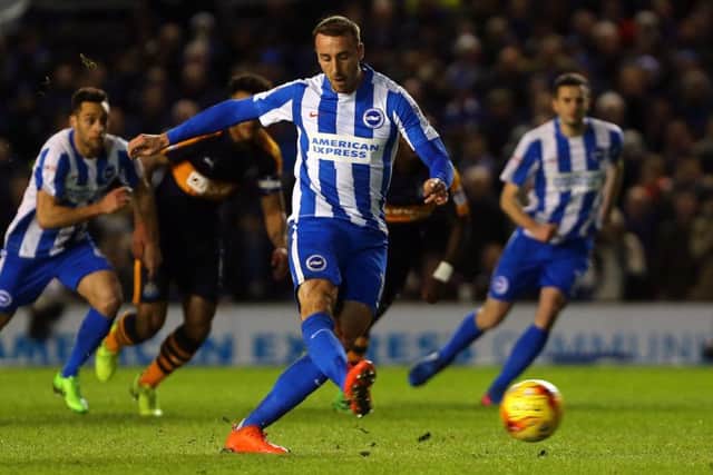Brighton's Glenn Murray scores his side's opening goal from the penalty spot during the earlier meeting against Leeds this season. Picture: Gareth Fuller/PA.
