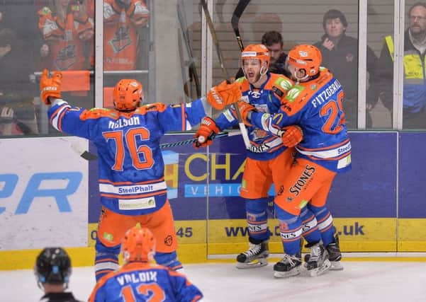 'HE'S ON FIRE': Robert Dowd celebrates scoring a goal in the 3-2 Challenge Cup Final defeat to Cardiff Devils. Picture: Dean Woolley.