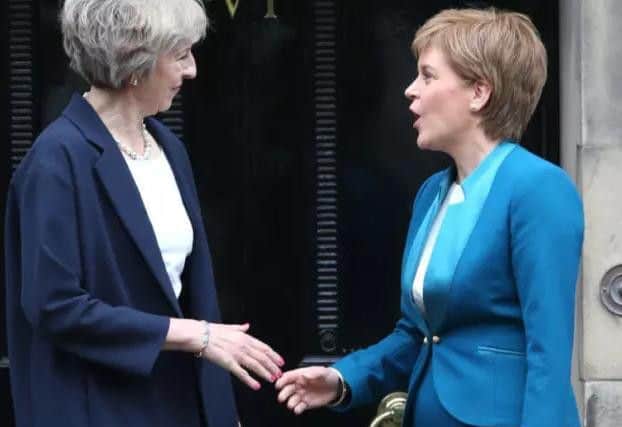 Theresa May has accused Nicola Sturgeon's SNP party of being 'obsessive' nationalists.
