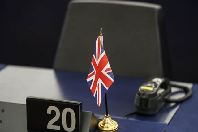 The empty seat of former UKIP leader Nigel Farage is pictured at the European Parliament in Strasbourg, early Tuesday, March 14, 2017. Britain lurched closer to leaving the European Union Monday when Parliament stopped resisting and gave Prime Minister Theresa May the power to file for divorce from the bloc. (AP Photo/Jean-Francois Badias)