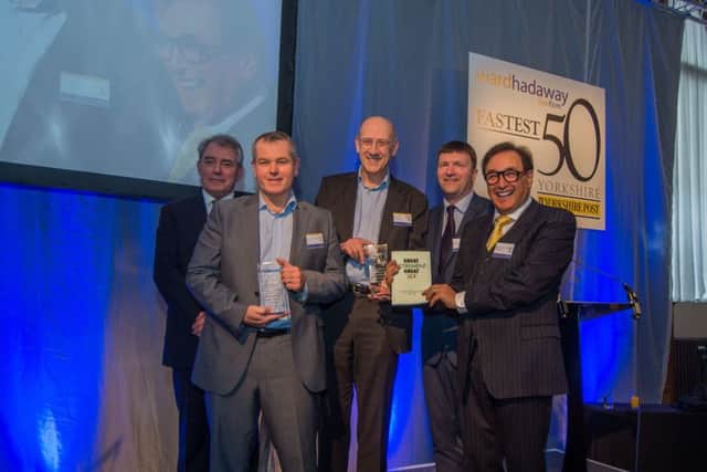 Date: 17th March 2017. Picture James Hardisty. Fastest 50 Awards 2017, held at Aspire, Infirmary Street, Leeds. Pictured Winner of the Fastest Growing Business Overall Hisense (left to right) Phil Jordan, of Ward Hadaway, Andrew Wood, of Hisense, Howard Grindrod, of Hisense, Greg Wright, Deputy Business Editor of Yorkshire Post, and guest speaker Larry Gould, CEO of thebigword.