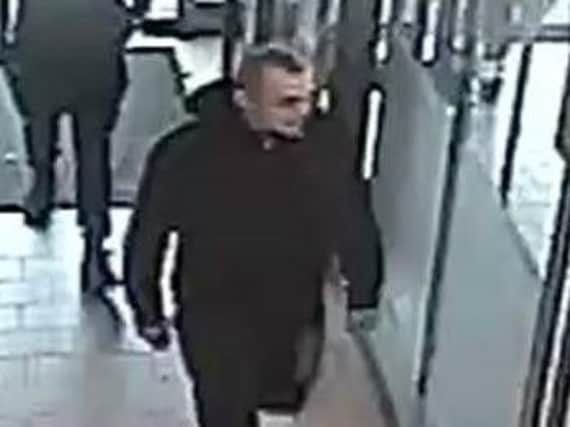 CCTV: One of the suspects wanted by West Yorkshire Police.