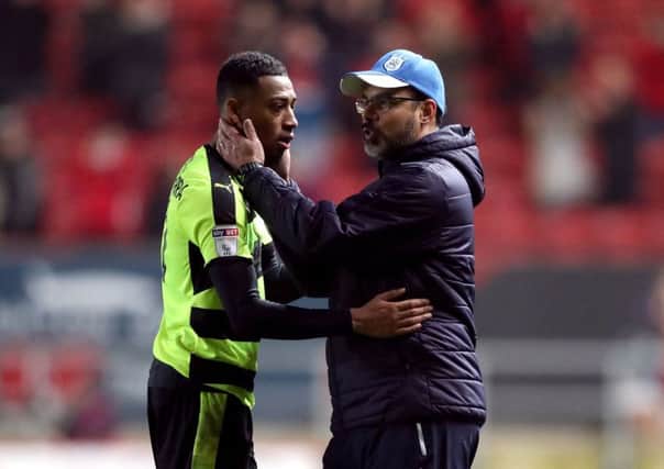 MOVE ON: Huddersfield Town manager David Wagner and Rajiv van La Parra chat after the 4-0 defeat at Ashton Gate. Picture: Adam Davy/PA.