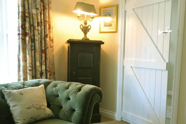 The sitting room is cosy and stylish