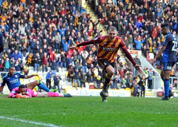 Charlie Wyke celebrates his late brace to pull off a win.  Picture Tony Johnson.