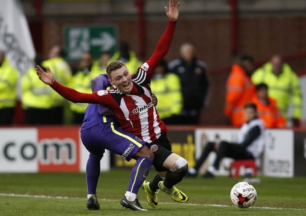 Sheffield United's Caolan Lavery is fouled during Saturday's clash at Bramall Lane. Picture: Simon Bellis/Sportimage