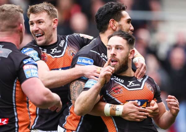 Castleford's Luke Gale celebrates his try with team-mates.