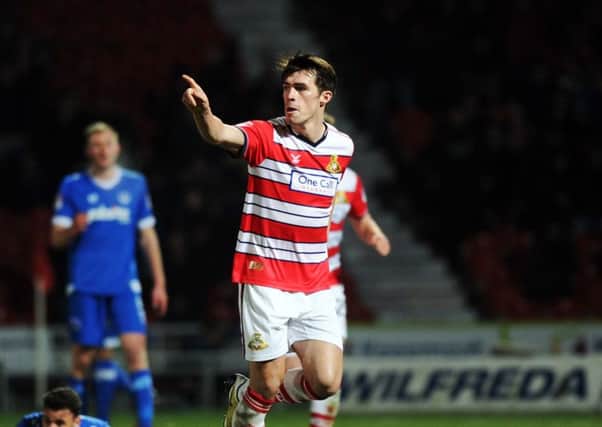 DOUBLE TROUBLE: John Marquis scored twice for Doncaster Rovers at Leyton Orient.