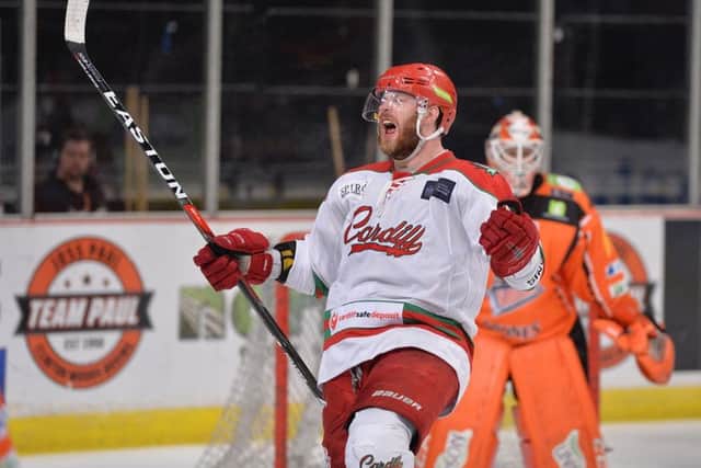 END GAME: Cardiff Devils' player-coach, Andrew Lord, celebrates scoring his side's fifth goal against the Steelers on Saturday. Picture: Dean Woolley.
