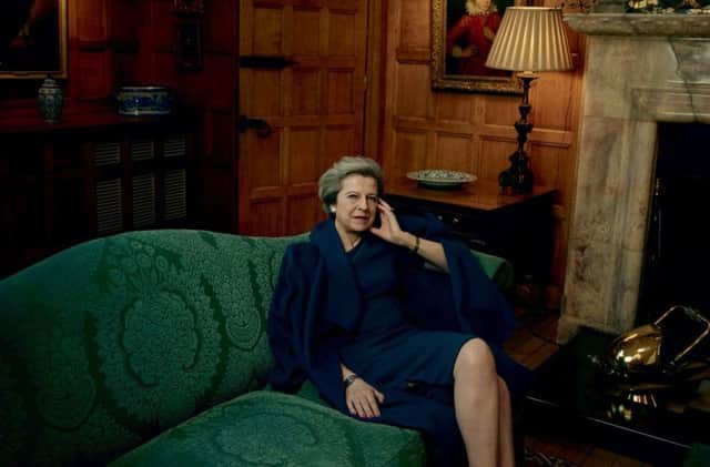 Prime Minister Theresa May, wearing an L.K.Bennett coat and dress as she was photographed by Annie Leibovitz for American Vogue.