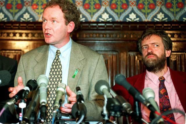 Martin McGuinness, leading Sinn Fein negotiator in the peace process, attending a news conference in the House of Commons, London, with Labour Party leader Jeremy Corbyn to his right.