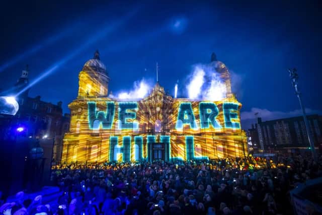 An installation titled We Are Hull by artist Zolst Balogh is projected onto the city's Maritime Museum, forming part of the Made in Hull series marking the official opening of Hull's tenure as UK City of Culture.