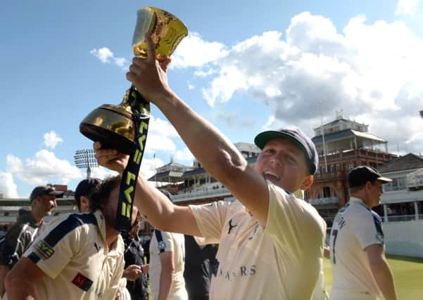 Was it worth it?: Gary Ballance, who will lead Yorkshire this summer, lifting the County Championship trophy at Lords in 2015.  (Picture: PA)
