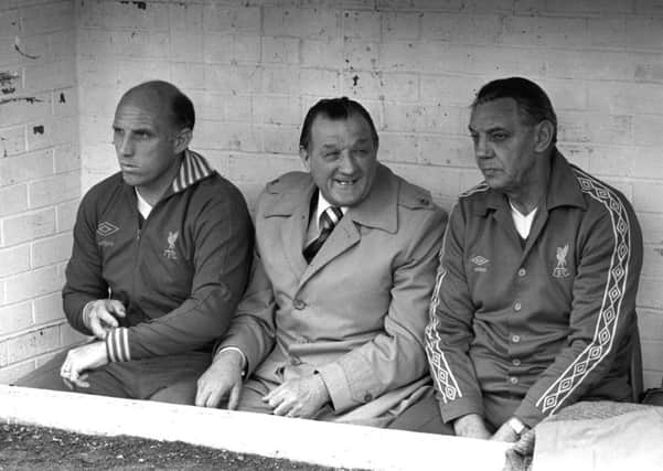 Manager Bob Paisley (centre), who took over from Bill Shankly in 1974,  is flanked by trainer Ronnie Moran (left) and assistant manager Joe Fagan.  Former Liverpool captain, coach and caretaker manager Ronnie Moran has died aged 83, his son Paul has announced. (Picture: PA)