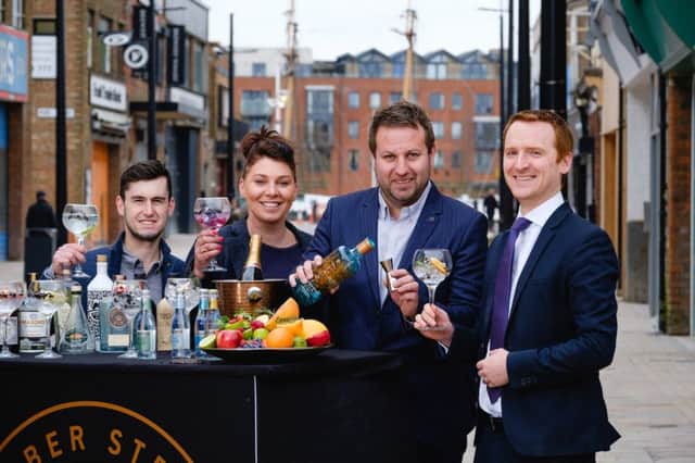 Craig Heads (left), Charlotte Bailey and Lee Kirman from Humber Street Distillery Co raise a toast to their new venture with Wykeland Groups Tom Watson.