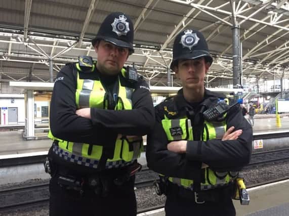 PC Matthew Linley and PC Gary Reader. Picture issued by Gemma Pettman PR.