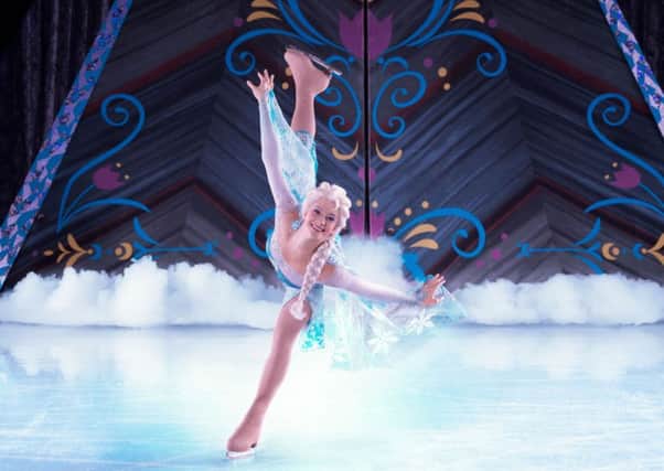 Elsa in Disney on Ice presents Frozen.