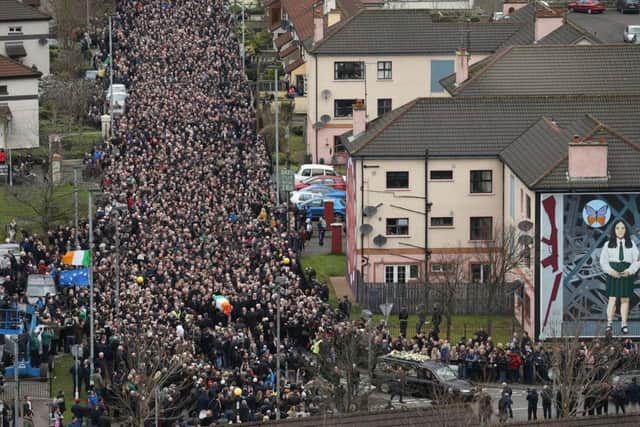 The coffin of Northern Ireland's former deputy first minister and ex-IRA commander Martin McGuinness is carried down Westland Street into the Bogside ahead of his funeral
