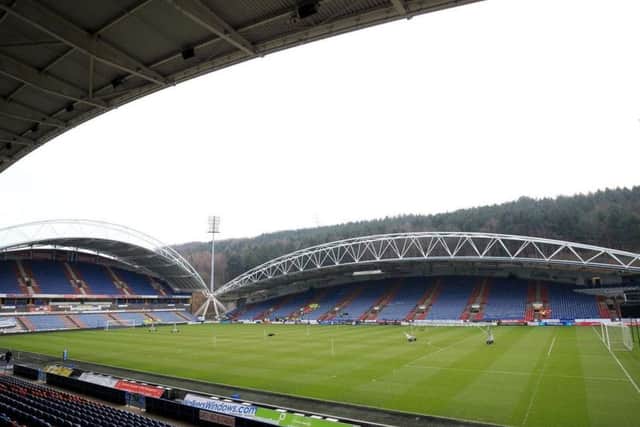 Huddersfield Town's John Smith's Stadium - fans will pay less than Â£200 for season tickets next season, no matter which dvision they play.
