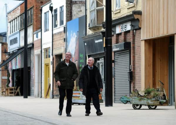 Hull fruit and veg wholesalers Phil Hough and Dennis Butler, who were moved out of the city centre, return to Humber Street, home of the original Fruit Market. Picture Jonathan Gawthorpe.