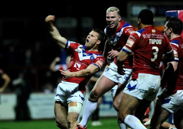 Wakefield Trinity's Jacob Miller celebrates his try against Leigh Centurions (
Picture: Jonathan Gawthorpe).