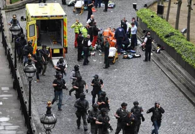 Scene of terror as emergency services react to the attack on Westminster.
