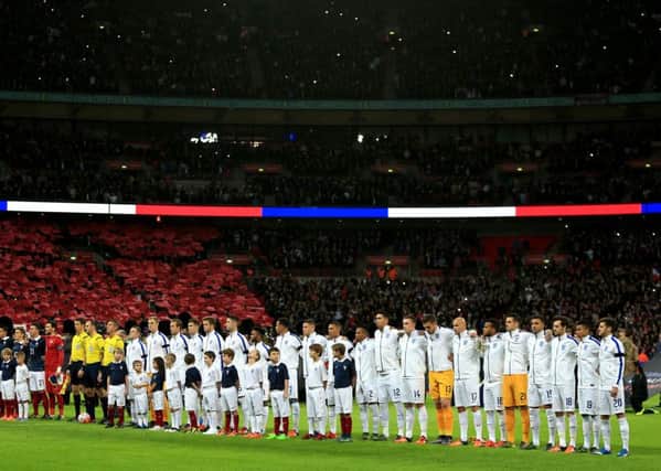 England fans joined their French counterparts in a rousing rendition of La Marseillaise before a friendly match at Wembley last year. It was a show of solidarity after the terrorist attacks in Paris on November 13, 2016. (Picture: Mike Egerton/PA Wire)