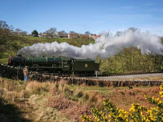 The Royal Scot steams through Darnholm along the North Yorkshire Moors Railway on its first trip from Grosmont to Pickering.