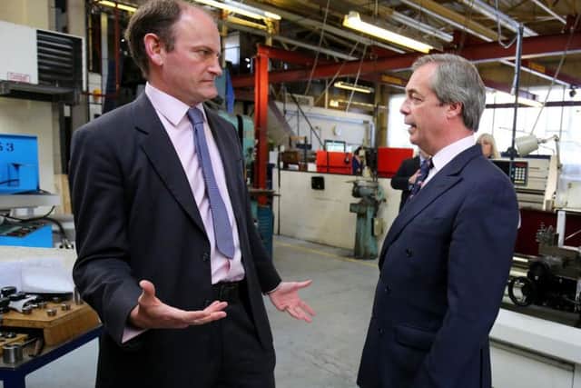 Nigel Farage (right) with Douglas Carswell. Mr Carswell said he was leaving 'amicably' and that there will be no need to call a by-election in his Clacton constituency as he will not be rejoining the Tories or switching allegiance to another party.