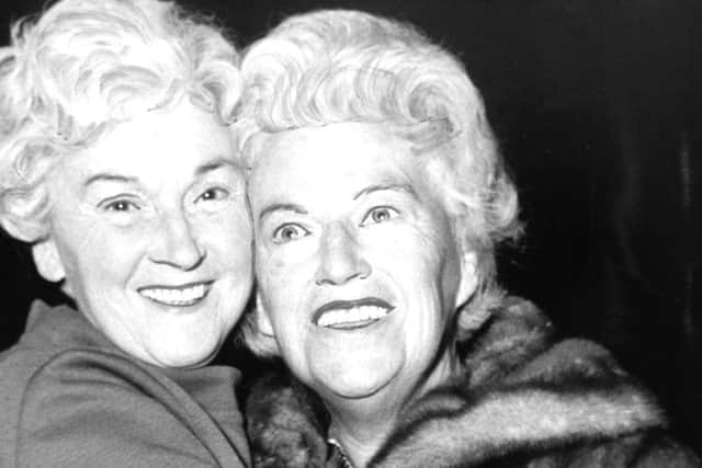 Gracie Fields, right, was greeted by her sister Edith Wakefield whenshe arrived in Leeds ahead of her appearance at Batley Variety Club in November 1968. (YPN).